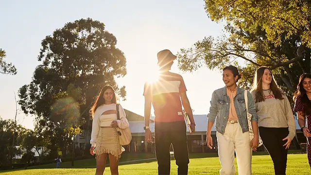 Sunlight Students walking on Bush Court