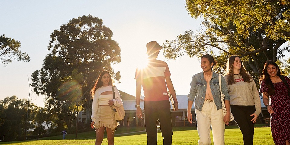Sunlight Students walking on Bush Court
