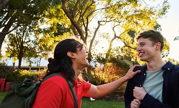 2 students at sunset on Bush Court