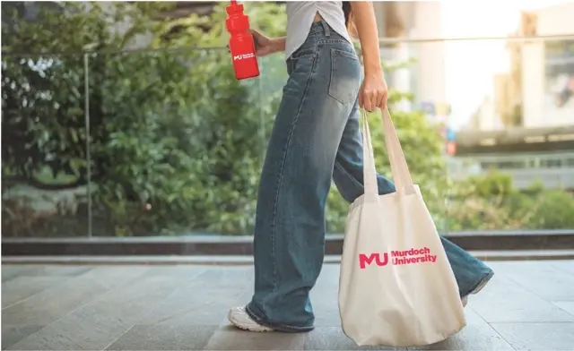 Student carried Murdoch branded tote bag and bottle