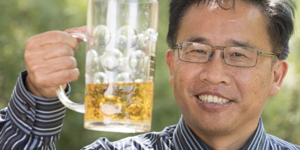 researcher with beer
