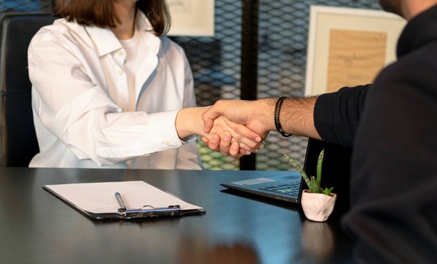Re-thinking Asian-Australian Leadership business handshake in office
