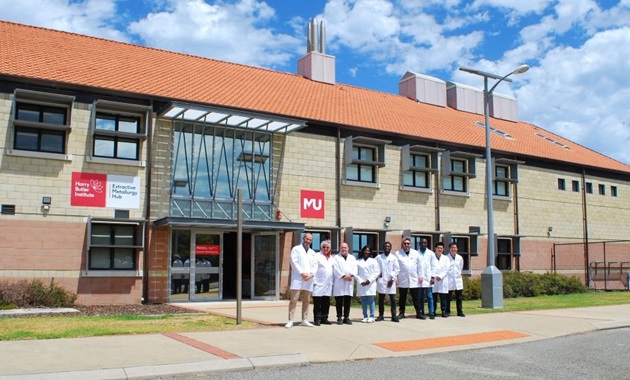 Researchers lined up outside the front entrance of the Hub