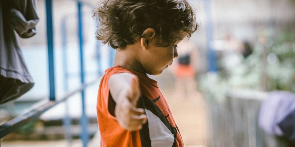 young boy stretching