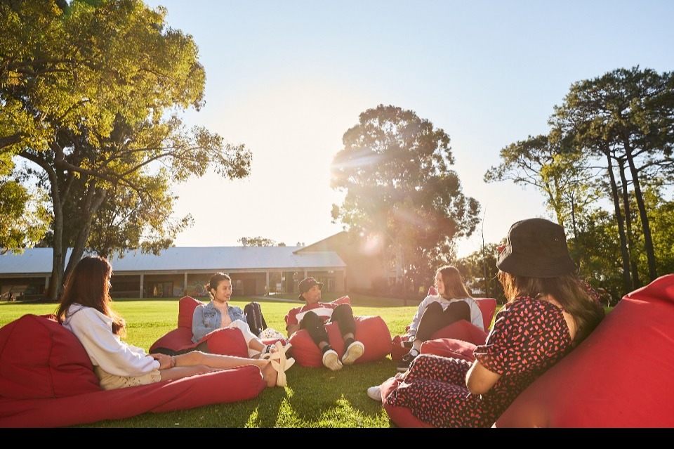 Students sitting on bean bags at Bush Court