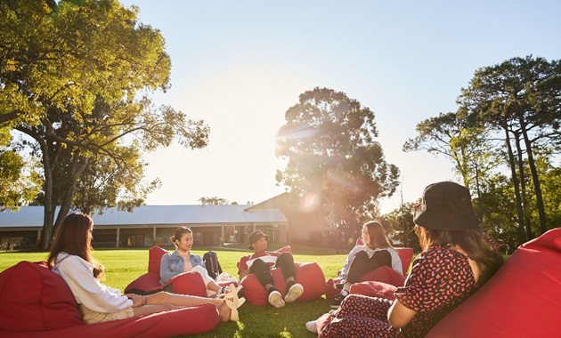 Students sitting on bean bags at Bush Court