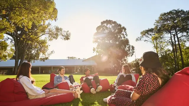 Students sitting on bean bags at Bush Court