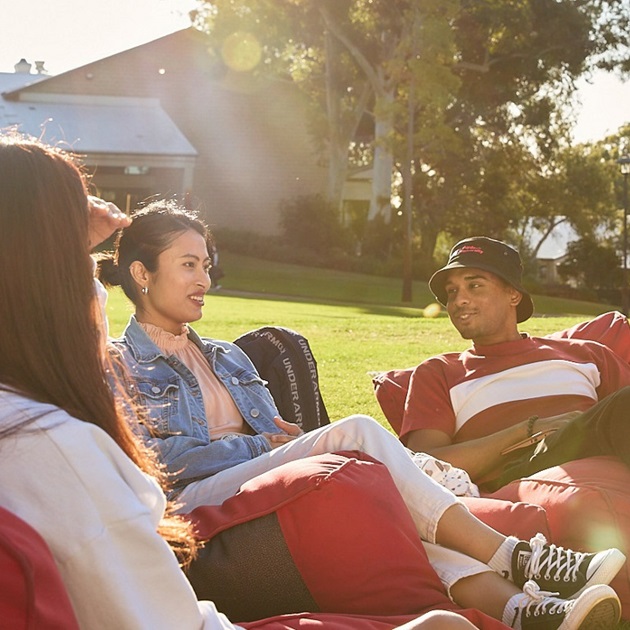 3 students on bean bags at Bush Court