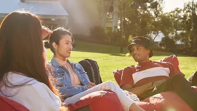 3 students on bean bags at Bush Court