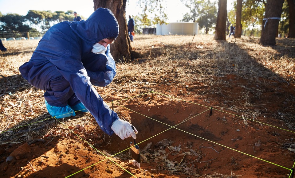 A Murdoch forensics student carrying out work at Whitby Falls Farm