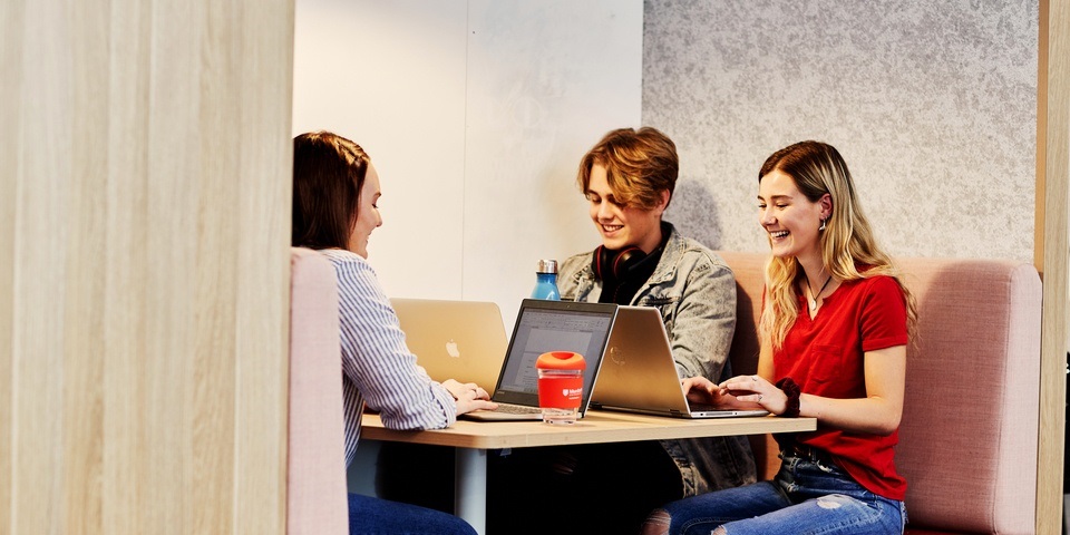 Students sitting at table