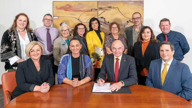 Senior leadership team signing The Voice statement