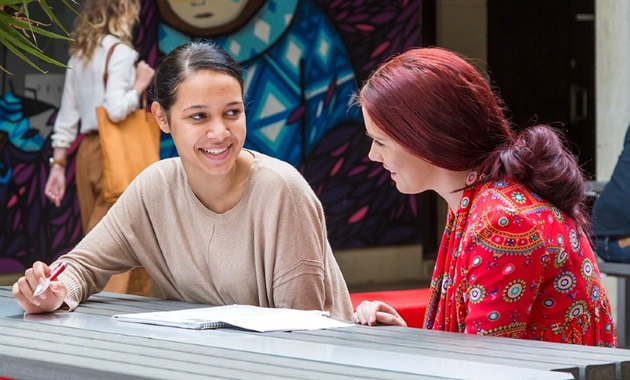 Two students from Kulbardi Aboriginal Centre working together.