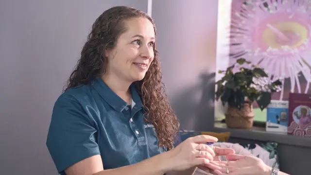 Clinician speaking with patient
