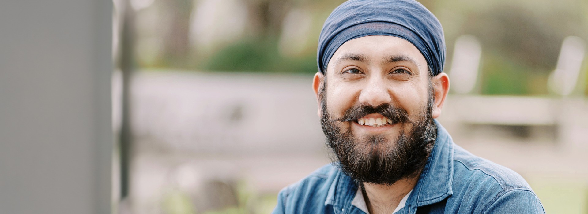 Postgraduate student looking directly at camera