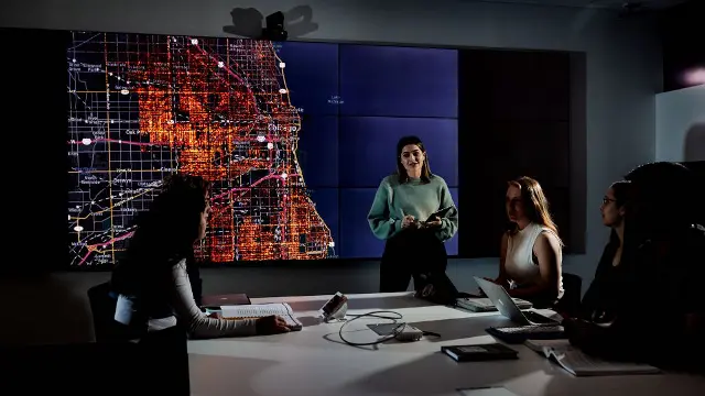 Criminology student presenting data visualisation to a seminar group