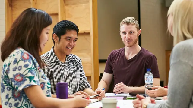 Students in discussion in a campus study area