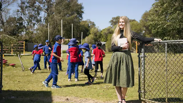 Education student with children playing sports