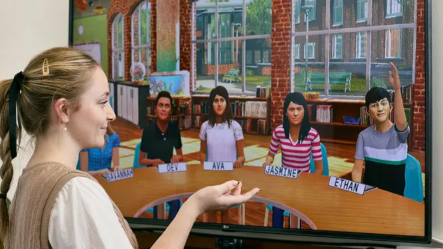 Education student presenting to a primary school class