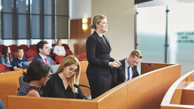 Law students observing a moot court proceeding