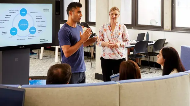 Student presenting to peers in a seminar or tutorial