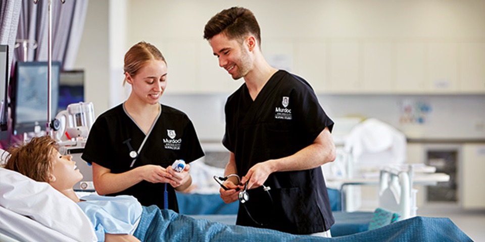 2 nursing students in practive lab