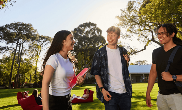 3 students together on Bush Court
