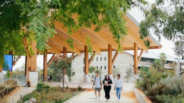 Three Murdoch University students outside Boola Katitjin