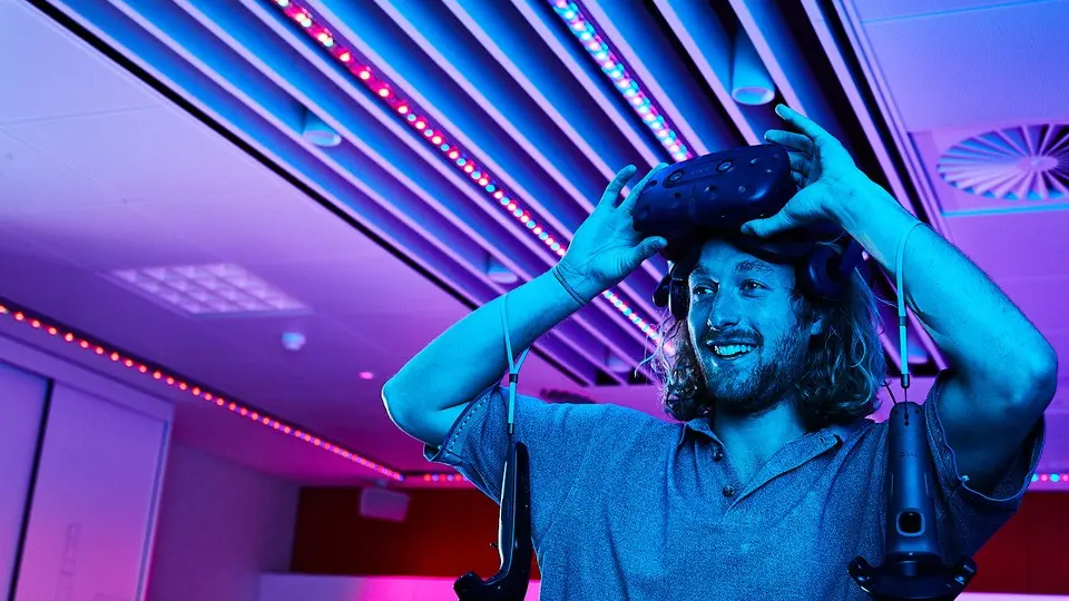 man testing virtual reality helmet