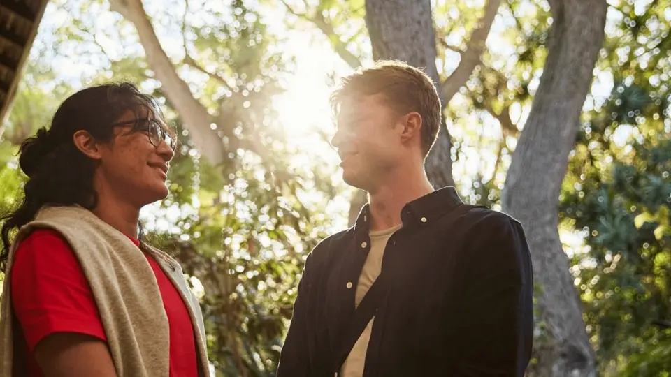 Two Murdoch University students talking and laughing