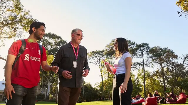 Students laughing together on Bush Court