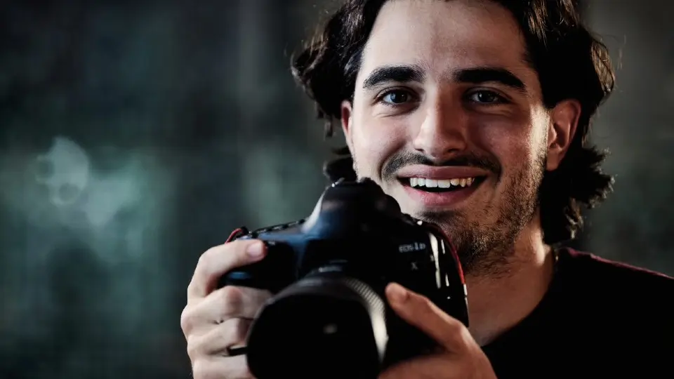 Creative media student with a camera.