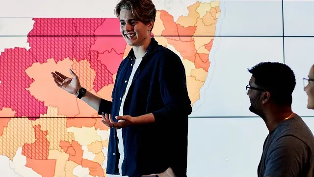 Murdoch University students presenting with map