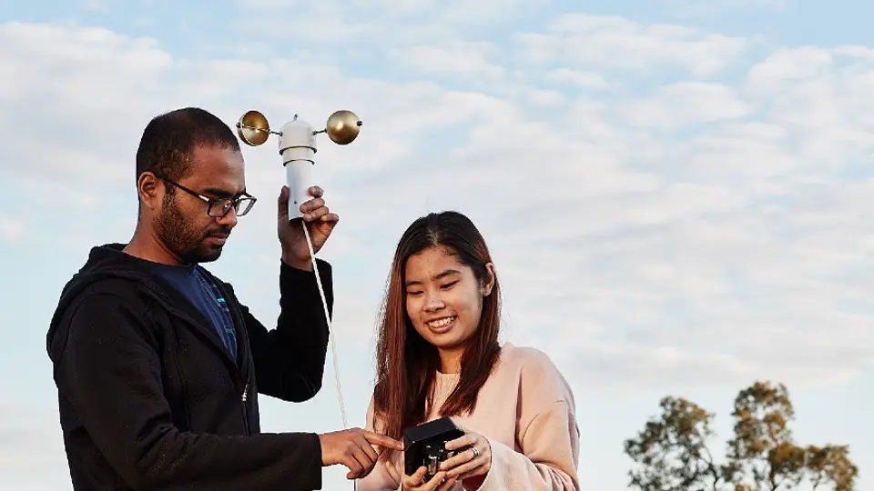 Engineering and Energy Student working on a invention ourdoors