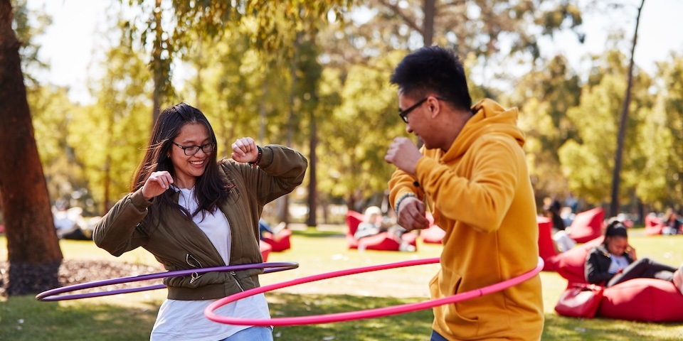 Students hula-hooping
