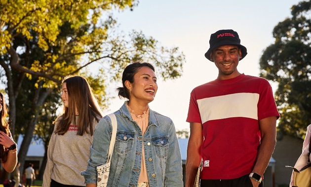 Students walking together on Bush Court