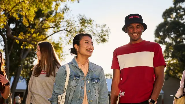 Students walking together on Bush Court