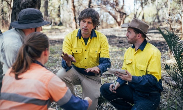 Dr Joe Fontaine in the field with students.