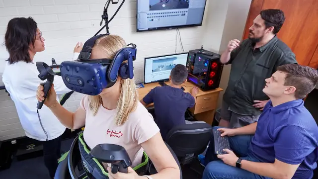 A team of students working on virtual reality technology.