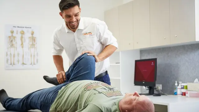 A patient being treated at the Murdoch Chiropractic Clinic.