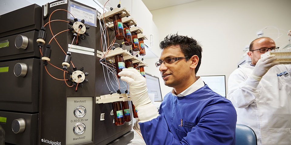 Researcher using machinery