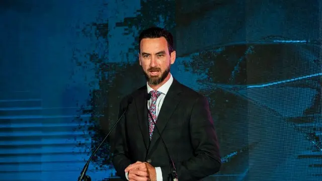 Murdoch alumni giving a speech,