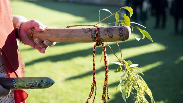 A First Nations Elder performing a Welcome to Country ceremony