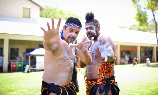 First Nations dancers perform in traditional dress