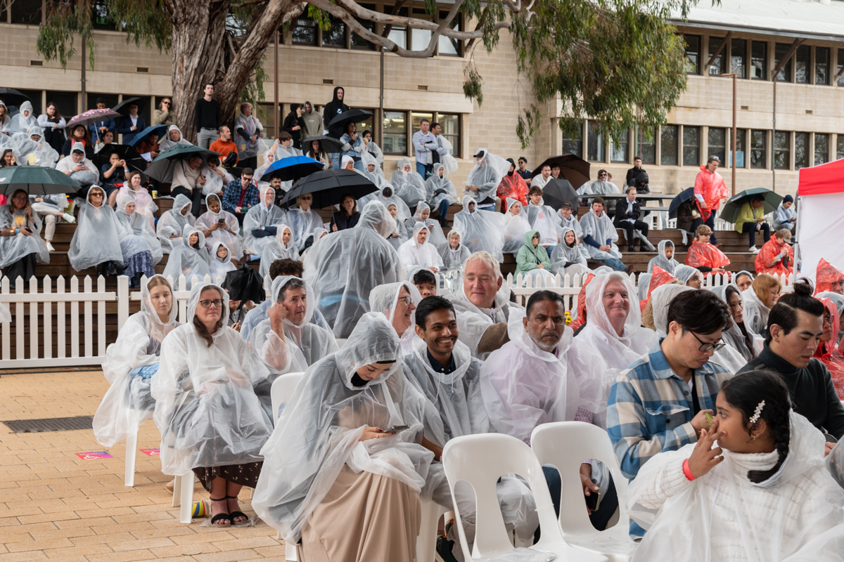 Guests in ponchos due to wet weather