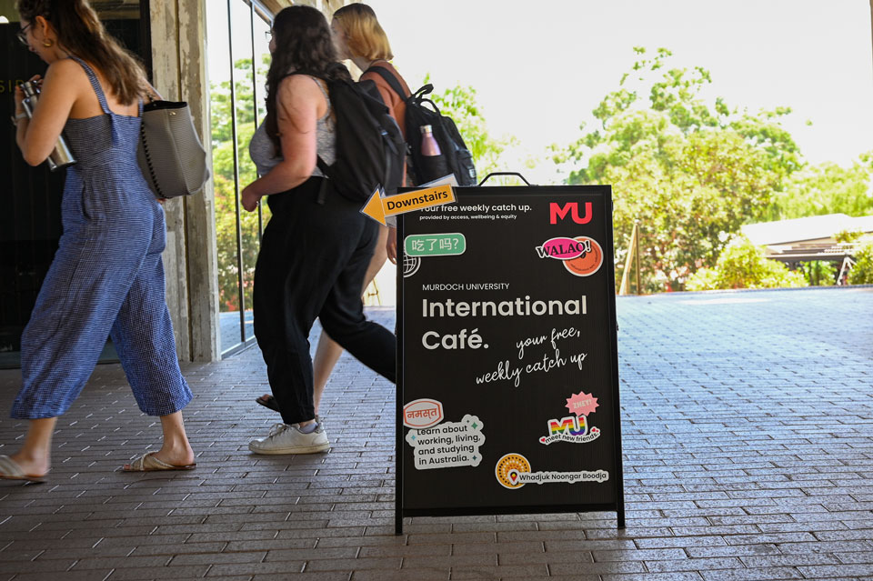 A sign outside a café with the words 