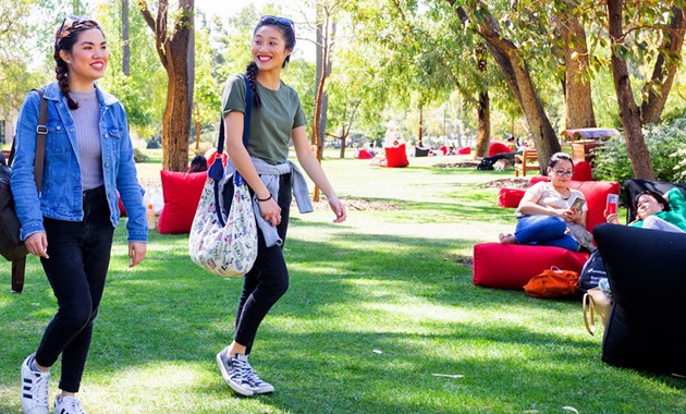 students walking in bush court