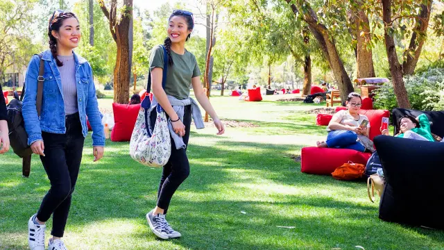 students walking in bush court
