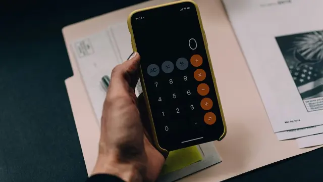phone with calculator app on desk