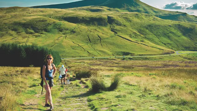 people walking in countryside